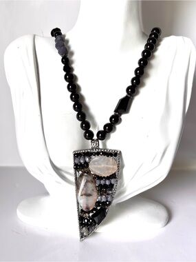 Triangular pendant necklace with black agate stones and translucent Chalcedon